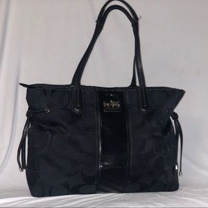 Coach bag with black signature canvas